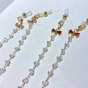 Catenina per occhiali in cristallo con fiocchi vintage e ganci in silicone