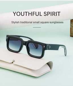 Fashion square sunglasses with blue gradient lenses on a beige glasses case