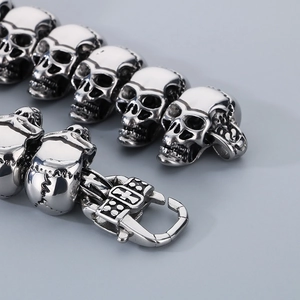Polished silver stainless steel skull bracelet with gothic cross clasp for men