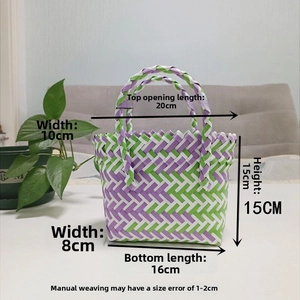 Detail view of colorful hand-woven basket showing geometric purple and green patterns