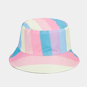 Detailed view of the multi-color pastel striped pattern on a reversible bucket hat