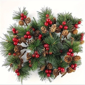 Christmas pine needle bouquet with red berries and natural pine cones on white background