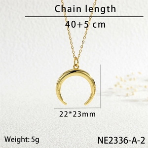 Macro shot of gold horn pendant necklace with chain dimensions 40+5 cm and weight 5g