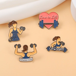 Lot de 4 pin's fitness en émail avec poids et citations motivantes sur fond orange chaud