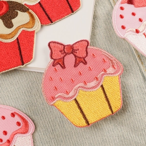 Embroidered cupcake patches with colorful thread on denim for DIY clothing decoration