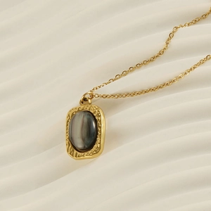 Elegant gold titanium steel necklace featuring a grey tiger eye stone square pendant