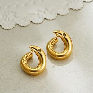 Polished 18K gold teardrop stud earrings with minimalist twisted wave design for women