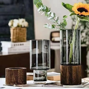 Modern grey glass cylinder flower vase with premium dark brown wooden base for home decor