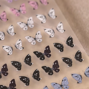 3D realistic butterfly nail art stickers in various colors with translucent texture