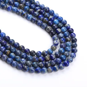 Natural lapis lazuli round beads with deep blue tones and golden pyrite inclusions