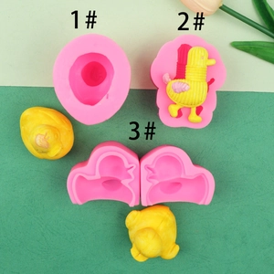 Detailed view of pink silicone 3D duck molds for DIY chocolate and soap crafting
