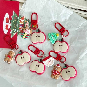 Christmas keychains set with resin gingerbread man, reindeer, and red apple charms