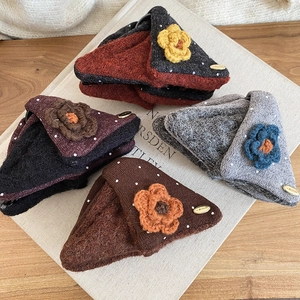 Handmade knitted triangular hair claw clips with plush flowers in elegant vintage colors