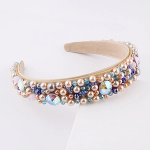Baroque padded headband with champagne pearls and blue crystals on a beige base