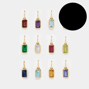 Detailed grid of eleven gold rectangular birthstone pendants with colorful zircon gems