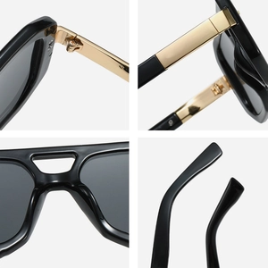Vintage polygonal double-bridge sunglasses with black resin frame and gold metal hinges