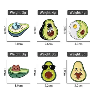 Creative avocado enamel pins set with astronaut cat and geometric fruit badge designs
