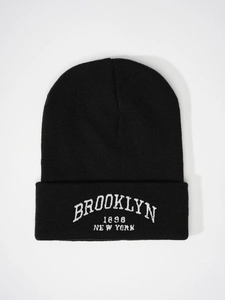 Detailed view of Brooklyn 1898 white embroidery on black ribbed knit beanie cuff