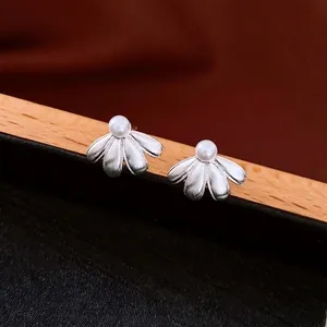 French vintage style brushed silver flower stud earrings with a central white pearl