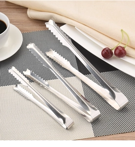 Detailed view of three stainless steel food tongs with serrated tips in different sizes
