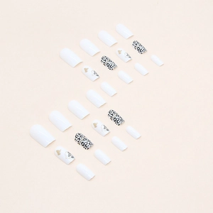 Glossy white and leopard print square press-on nails with golden heart details