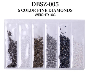 Close-up of 6-color fine nail art glass crystals in a transparent divided plastic case