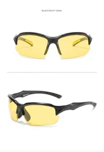 Detail of polarized night vision cycling sunglasses with black frame and yellow lenses