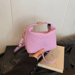 Purple woven texture crossbody pillow bag with gold hardware and adjustable strap