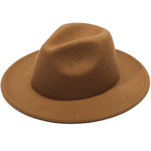 Classic British style brown wool fedora with a wide wavy brim and a pinched crown top