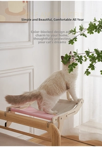 Close-up of solid wood cat window perch with pink fabric and sturdy metal hooks
