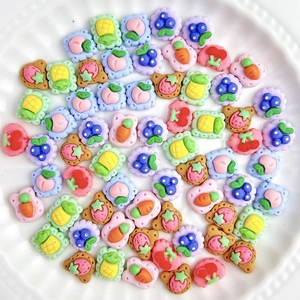 Mix of colorful resin fruit and bear charms for DIY crafts and nail art decoration