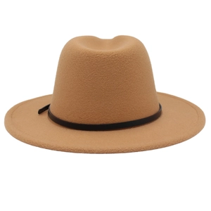 Close-up of camel wool fedora hat featuring a stylish black leather belt buckle detail