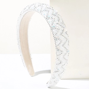 Handmade white beaded sponge headband with elegant wave pattern and glossy texture