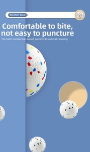 Detail of bouncy pet ball with colorful spots and textured surface for teeth cleaning