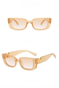 Detail of translucent tea rectangle sunglasses with gradient lenses and gold V decoration