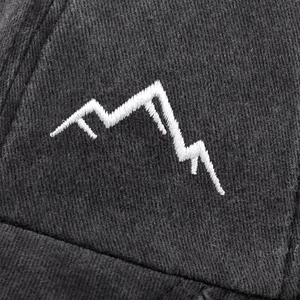 Street style dark grey trucker hat with white mountain peak embroidery detail