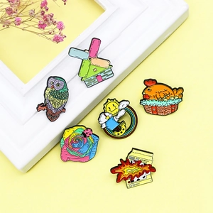 Enamel pin set featuring windmill owl chicken rainbow rose and milk carton designs