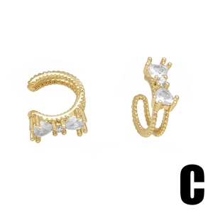 Gold-plated ear cuffs with zircon heart and round stones in a minimalist design