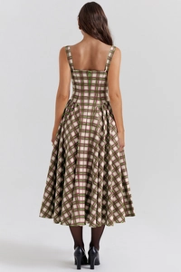 Back view of a plaid maxi dress with green and purple checks and an invisible zipper