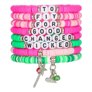 Close-up of colorful multilayer Heishi clay bracelets with witch hat and star wand charms