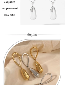 Detailed view of gold and silver teardrop earrings with mirror-polished finish