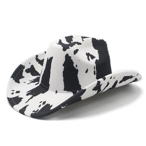 Classic western cowboy hat with black and white cow print and wide curved brim