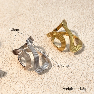 Minimalist irregular open rings in gold and silver finish with textured metallic surface