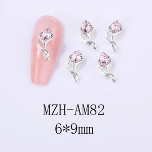 Detail of pink teardrop zircon nail charm with silver base, 6x9mm size MZH-AM82