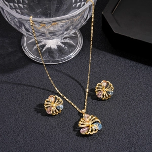 18K gold plated jewelry set featuring hollow flower pendants with colorful zircons