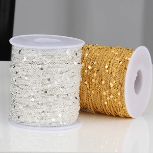Catene di paillettes metalliche oro e argento su rocchetti per gioielli fai-da-te
