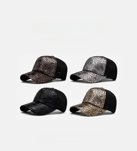 Detail view of geometric sequin baseball caps with breathable mesh in four metallic colors