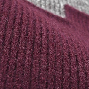 Thick burgundy ribbed knit beanie featuring fluffy mohair wool fibers for winter warmth