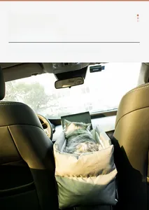 Light gray pet car seat for small dogs and cats installed on central armrest console