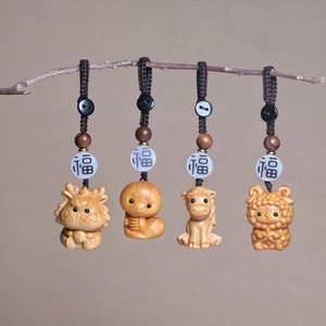 Detail of cartoon wooden zodiac charms dragon snake horse sheep with lucky beads